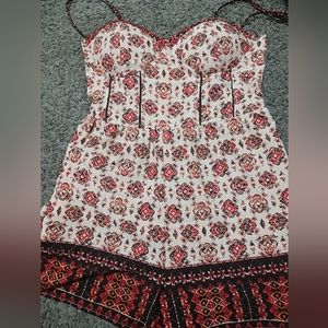 Romper brand: band of gypsie, size large colors red,black and tan